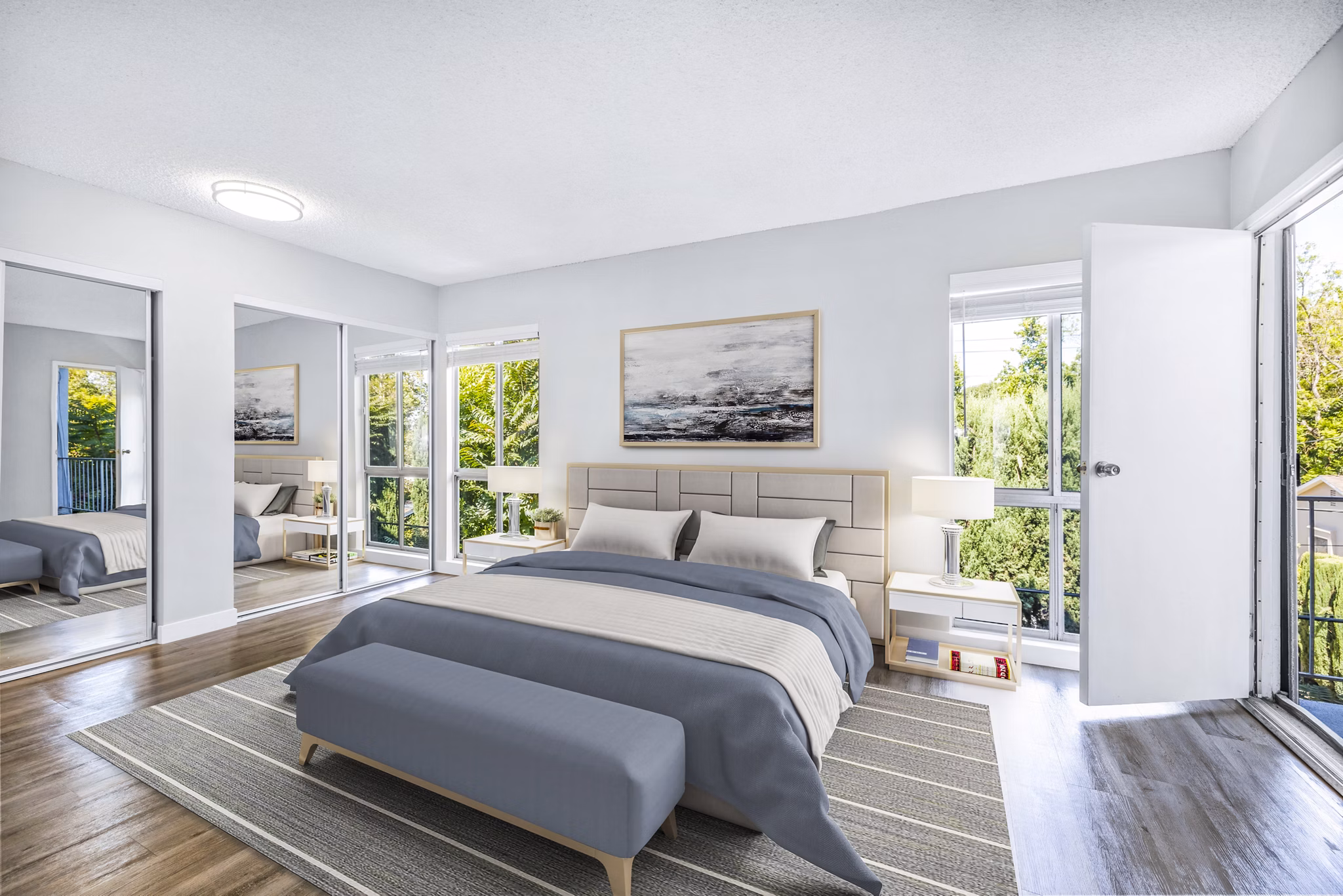 Luxurious bedroom with modern decor at The Fulton Apartments