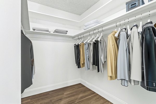 The Fulton Apartments: Bedroom closet with spacious shelving and storage solutions for luxury living