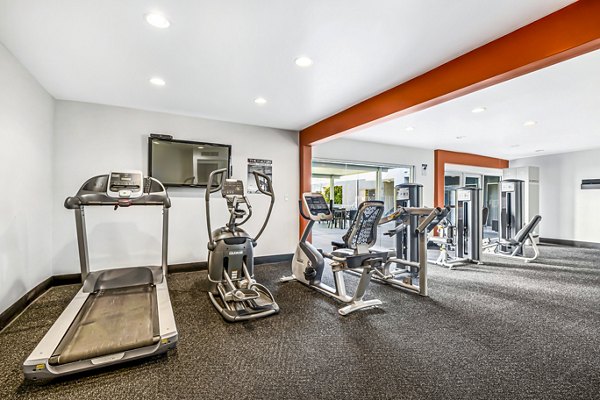 Fitness center with state-of-the-art equipment at The Fulton Apartments