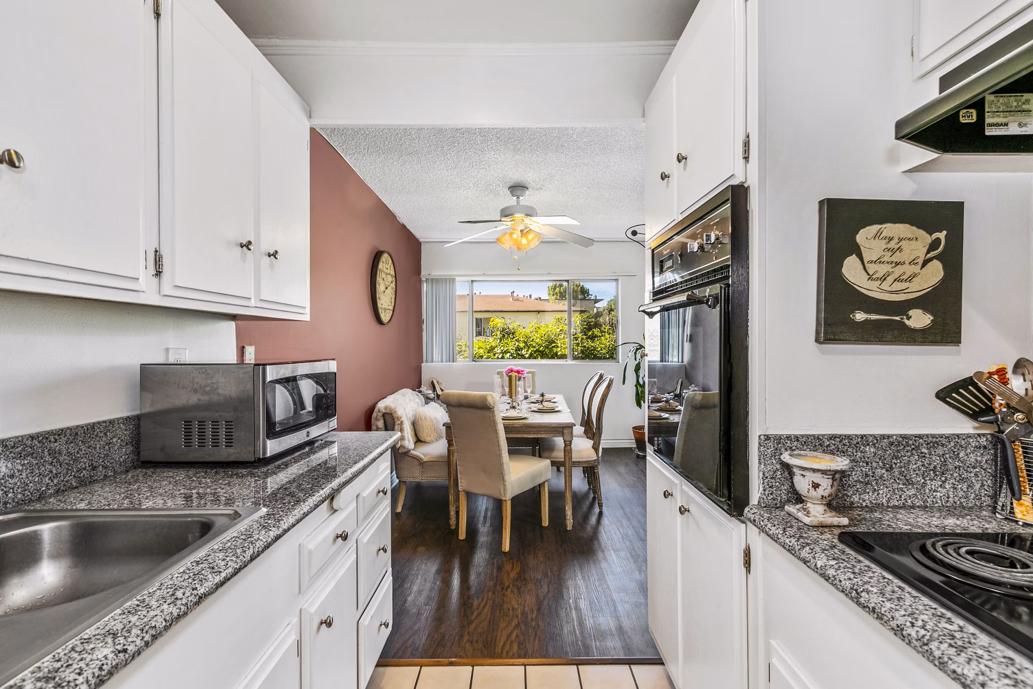 Modern kitchen with stainless steel appliances at The Fulton Apartments, a luxury Greystar property