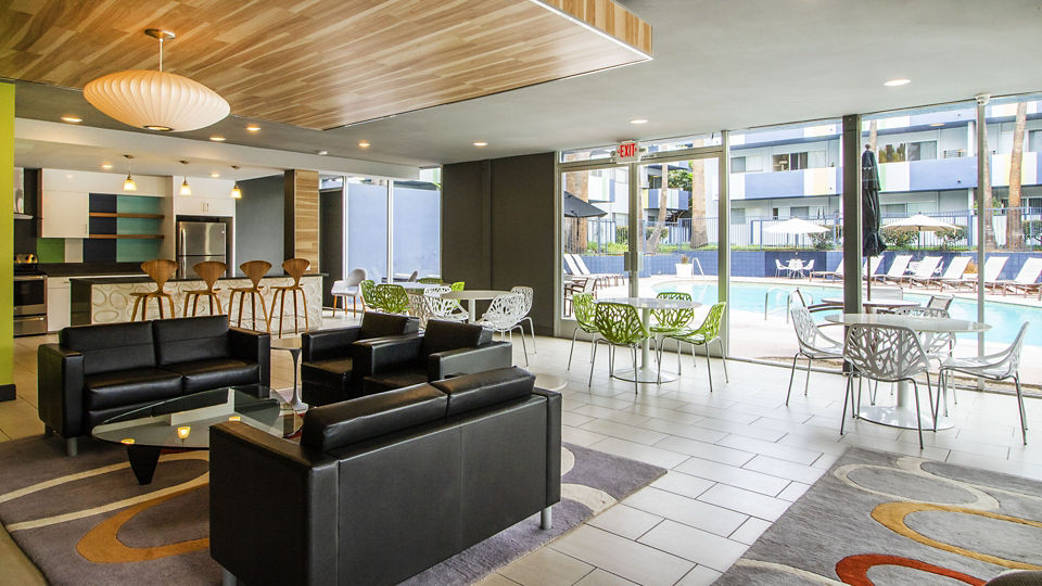 Clubhouse with modern furnishings at Milano Apartments: a luxury living experience in an exclusive community setting
