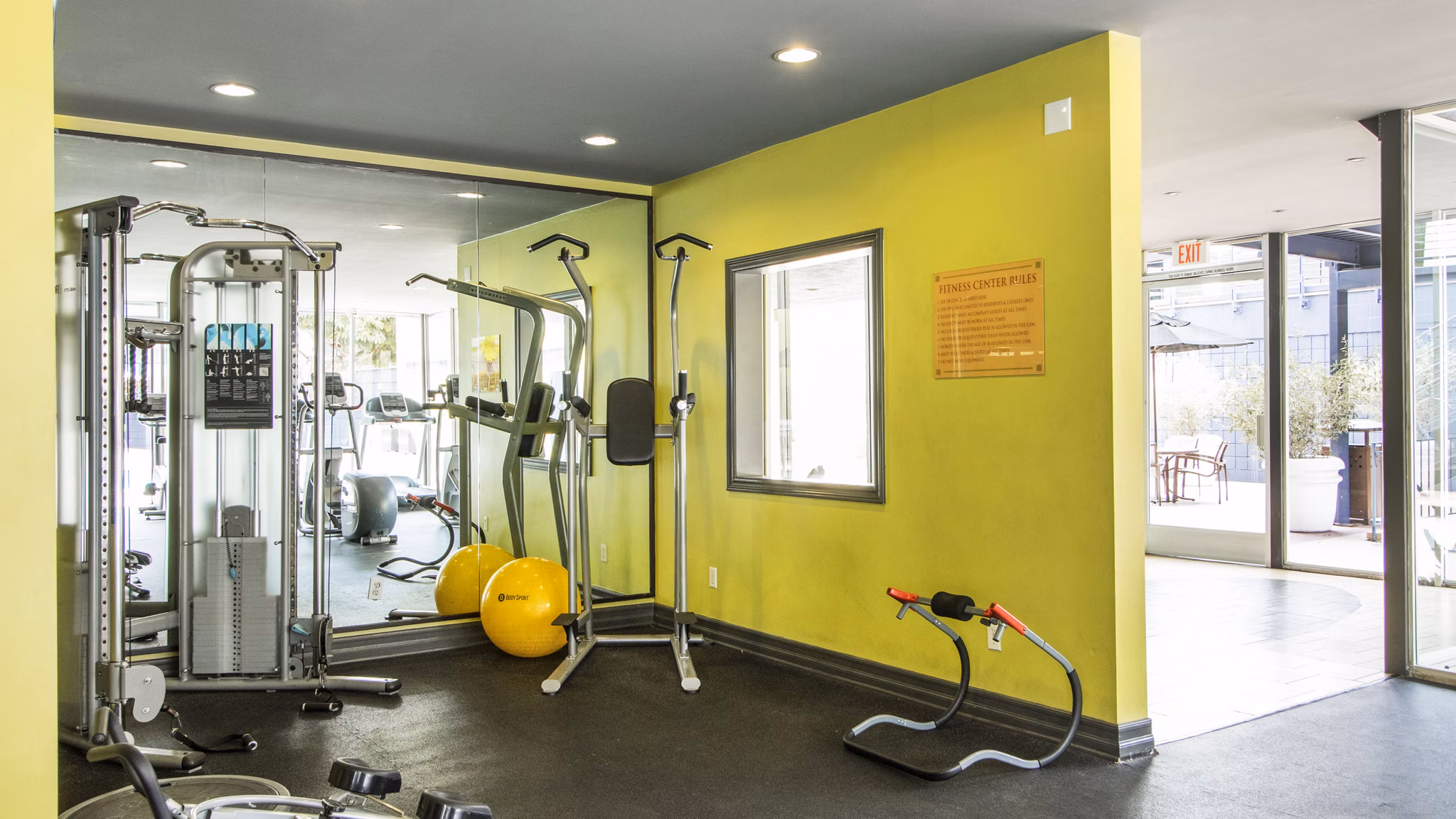 State-of-the-art fitness center equipped with modern machines at Milano Apartments, luxury living by Greystar