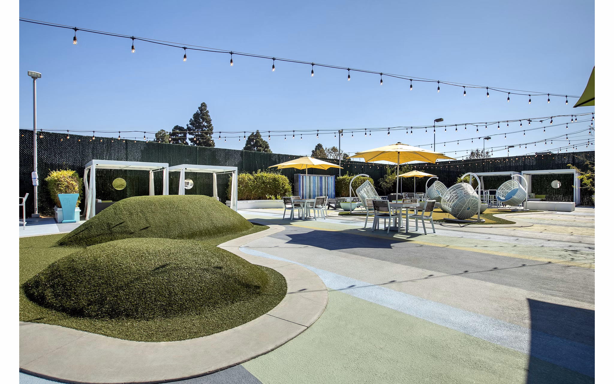Tranquil courtyard with lush landscaping at Milano Apartments