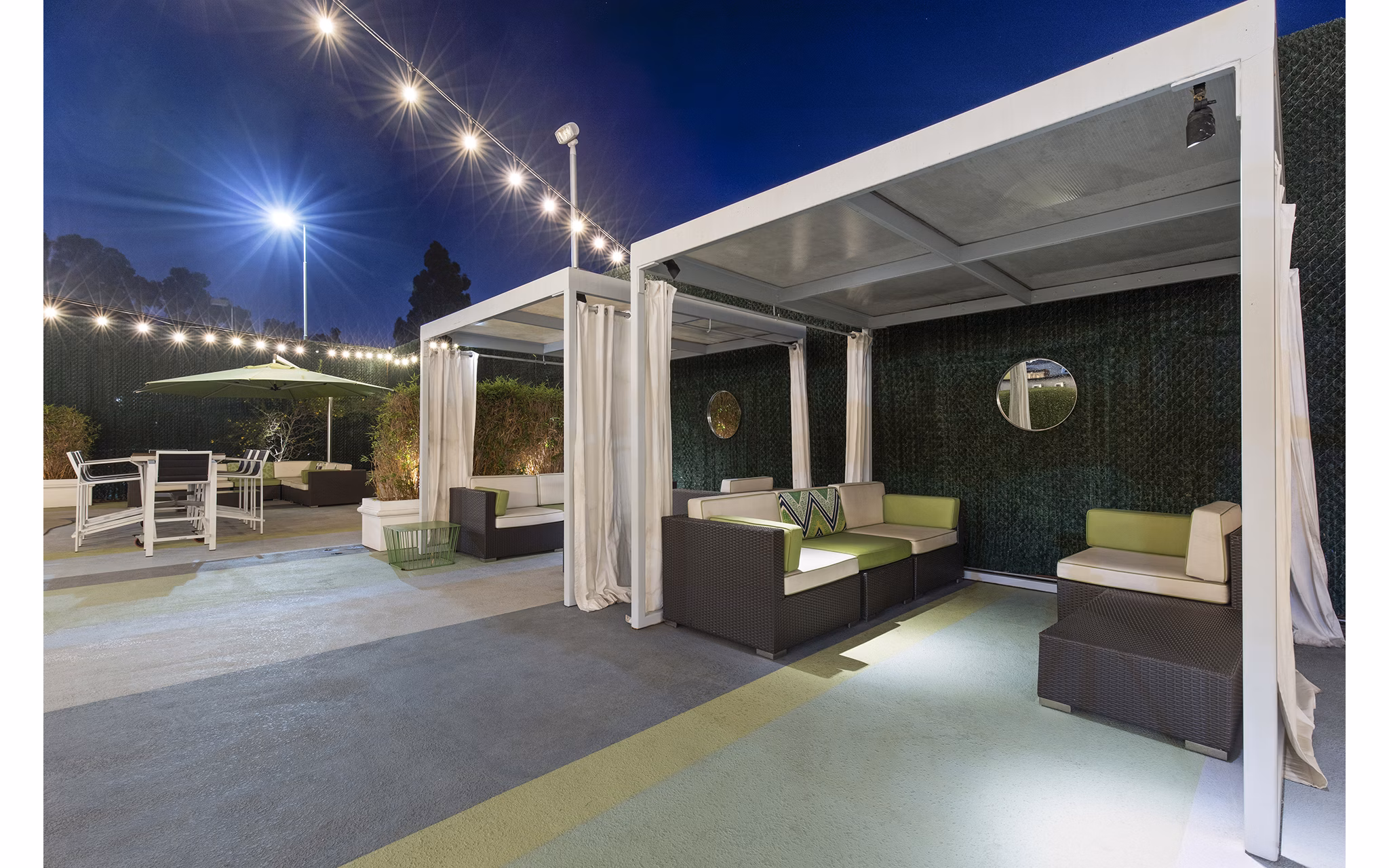 Milano Apartments: Tranquil courtyard with lush greenery and seating areas