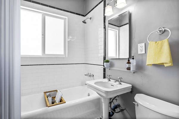 Bathroom featuring modern fixtures and sleek design at North Kingsley Apartments