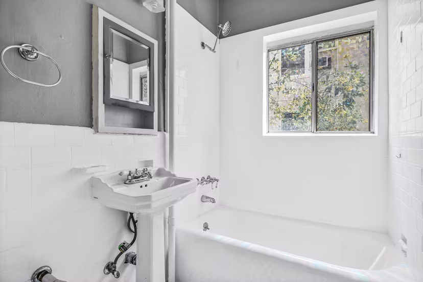Bathroom featuring modern fixtures and sleek design at North Kingsley Apartments, a Greystar luxury property