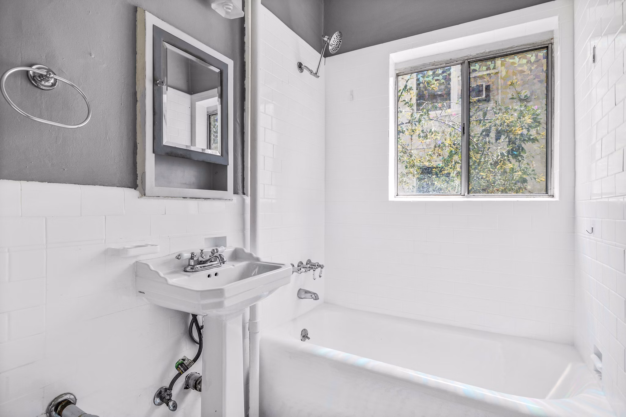 Bathroom featuring modern fixtures and sleek design at North Kingsley Apartments, a Greystar luxury property