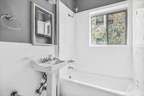 Bathroom featuring modern fixtures and sleek design at North Kingsley Apartments, a Greystar luxury property