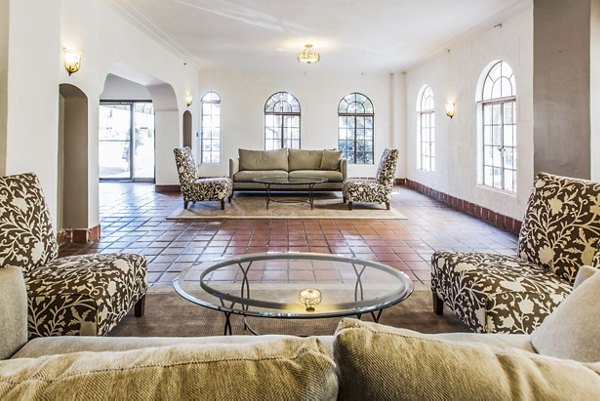 Clubhouse with stylish seating area and modern decor at North Kingsley Apartments