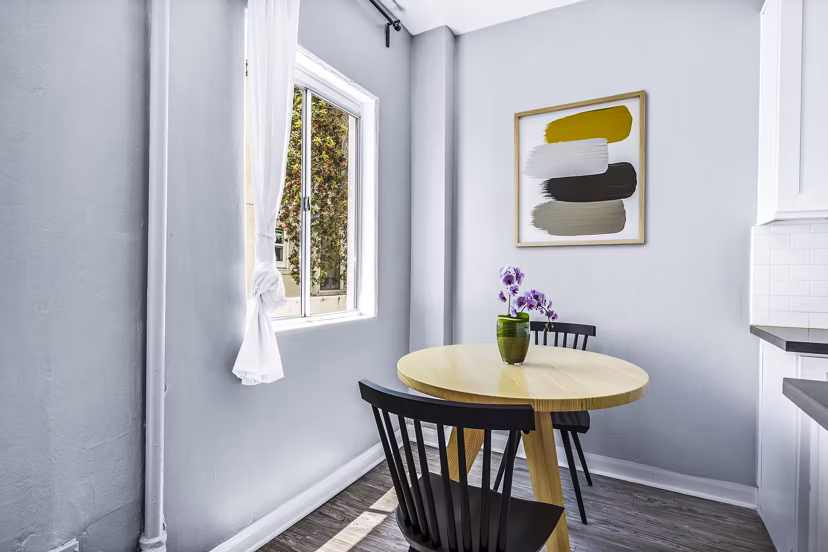 Dining room with modern fixtures and elegant decor at North Kingsley Apartments
