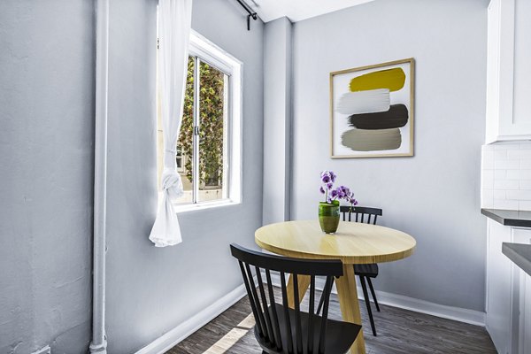 Dining room with modern fixtures and elegant decor at North Kingsley Apartments