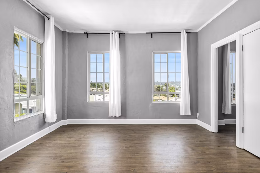 Spacious living room with modern decor in North Kingsley Apartments for luxurious living