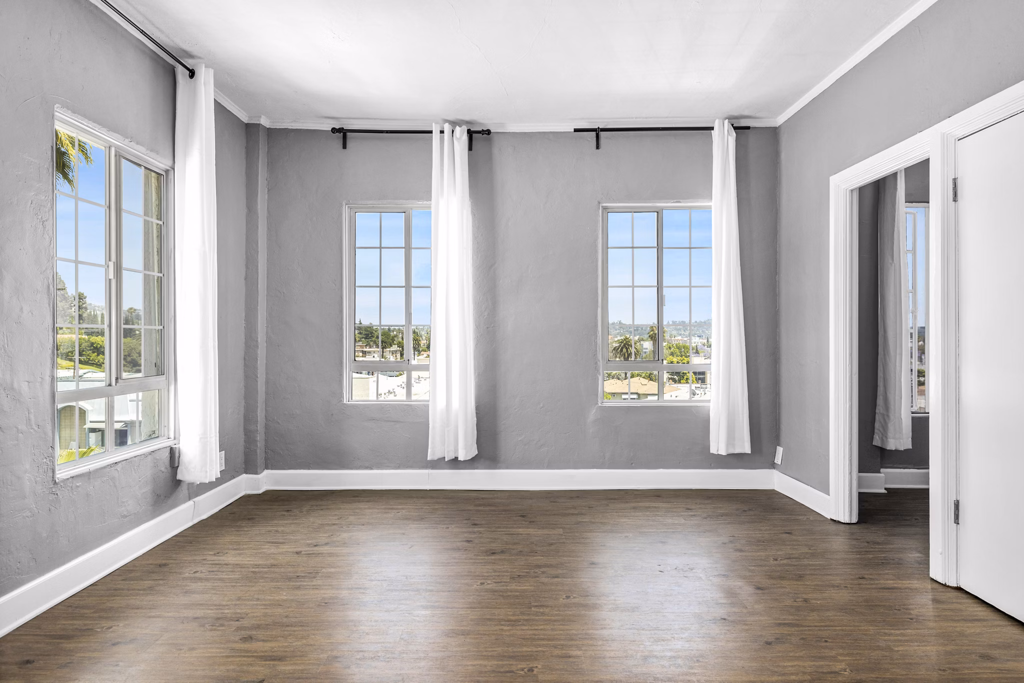 Spacious living room with modern decor in North Kingsley Apartments for luxurious living