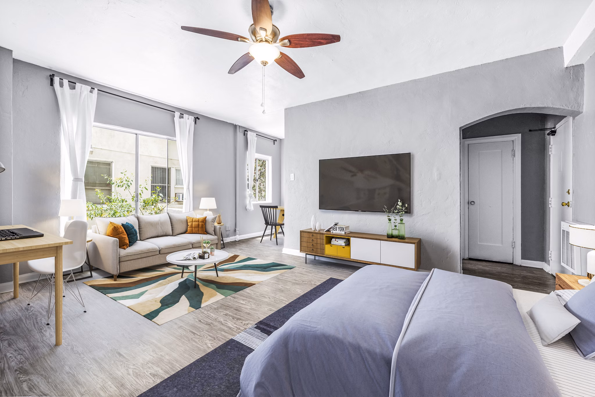 Cozy studio living room with stylish decor in North Kingsley Apartments