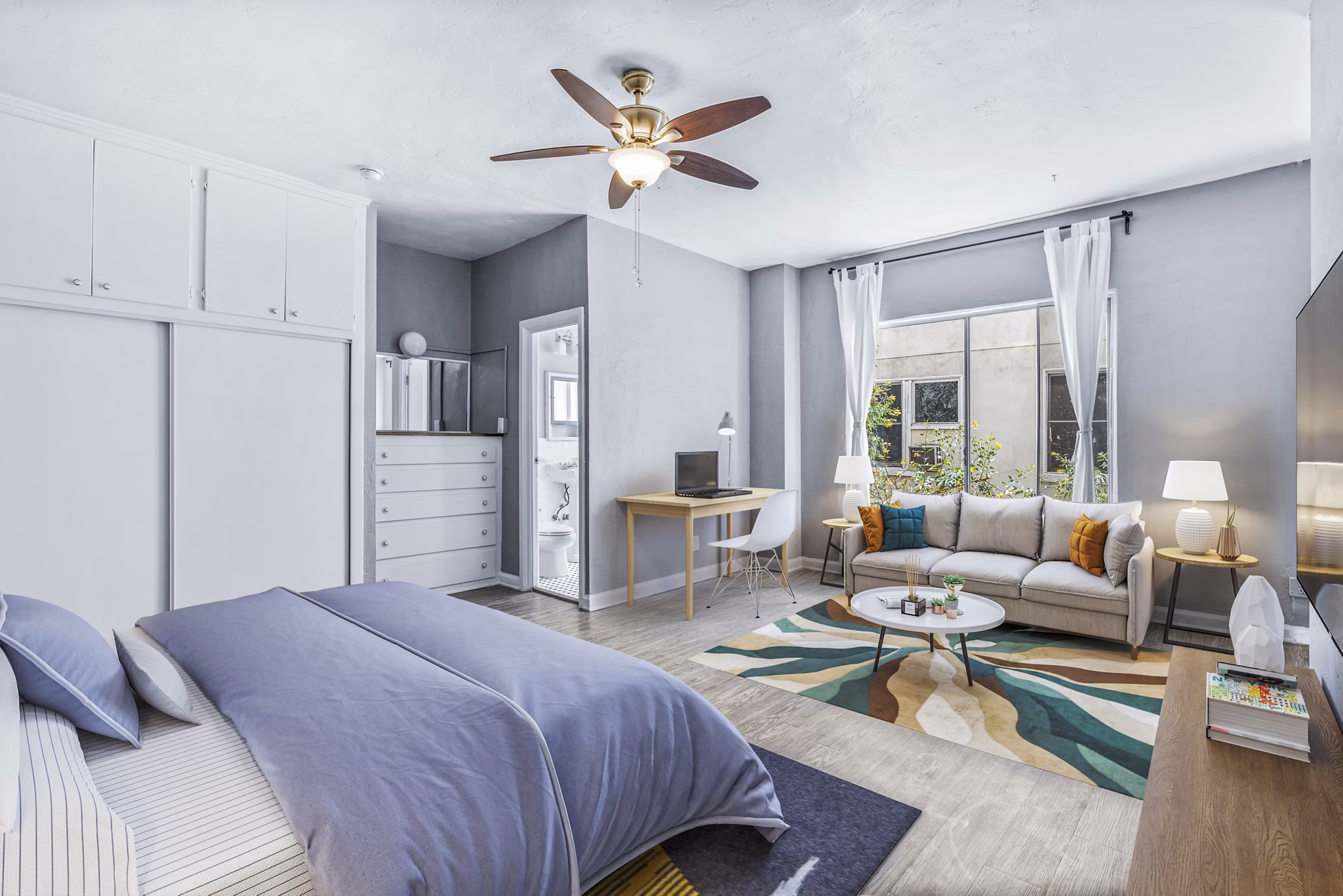 Studio featuring modern decor and open living area at North Kingsley Apartments Ideal for space-efficient luxury living in urban settings