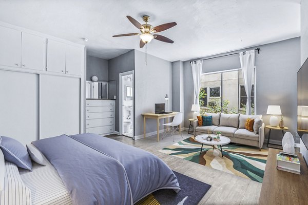Studio featuring modern decor and open living area at North Kingsley Apartments Ideal for space-efficient luxury living in urban settings
