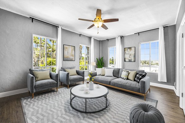 Spacious living room with modern decor at North Kingsley Apartments