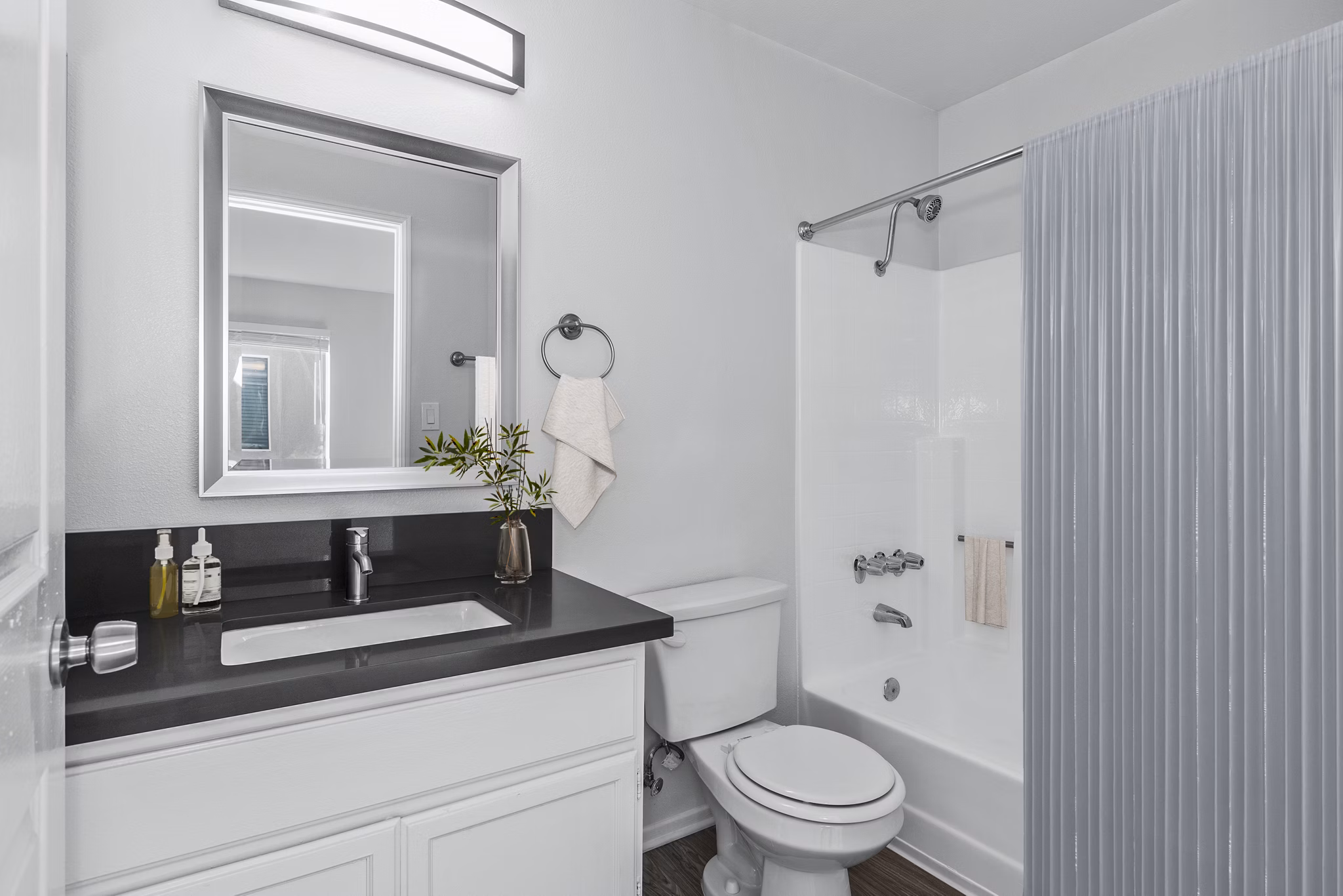 Modern bathroom with sleek finishes at Nova Townhomes Apartments