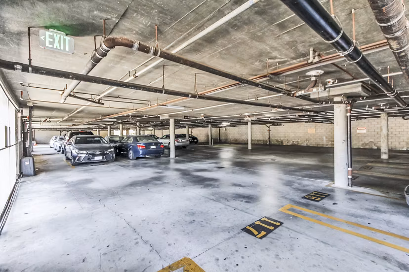 Covered parking garage at Nova Townhomes Apartments offering convenient and secure vehicle storage for residents