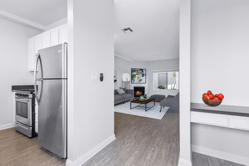 Modern kitchen with stainless steel appliances at Nova Townhomes Apartments