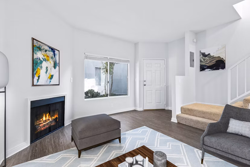 Cozy living room with modern decor at Nova Townhomes Apartments