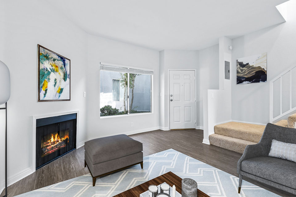 Cozy living room with modern decor at Nova Townhomes Apartments