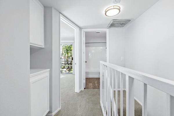 hallway and stairway at Nova Townhomes Apartments