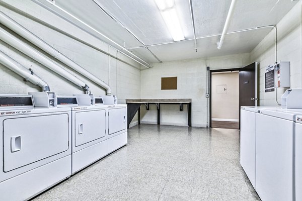 Convenient on-site laundry facility at Nova Townhomes Apartments offering modern amenities for residents