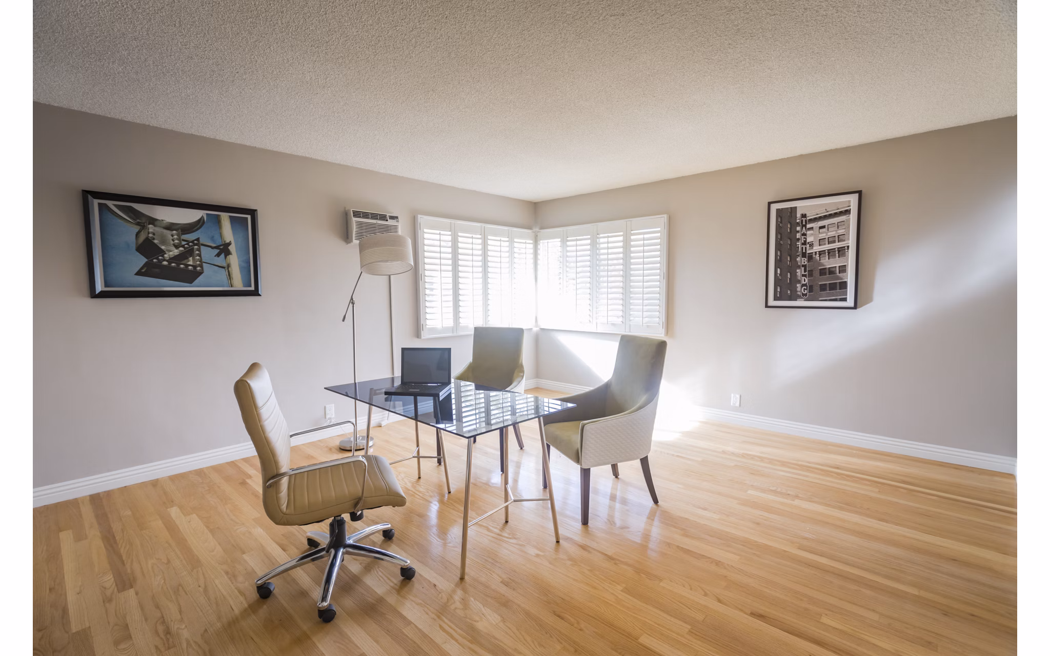 Home office featuring sleek desk and ergonomic chair at Orange Grove Circle Apartments