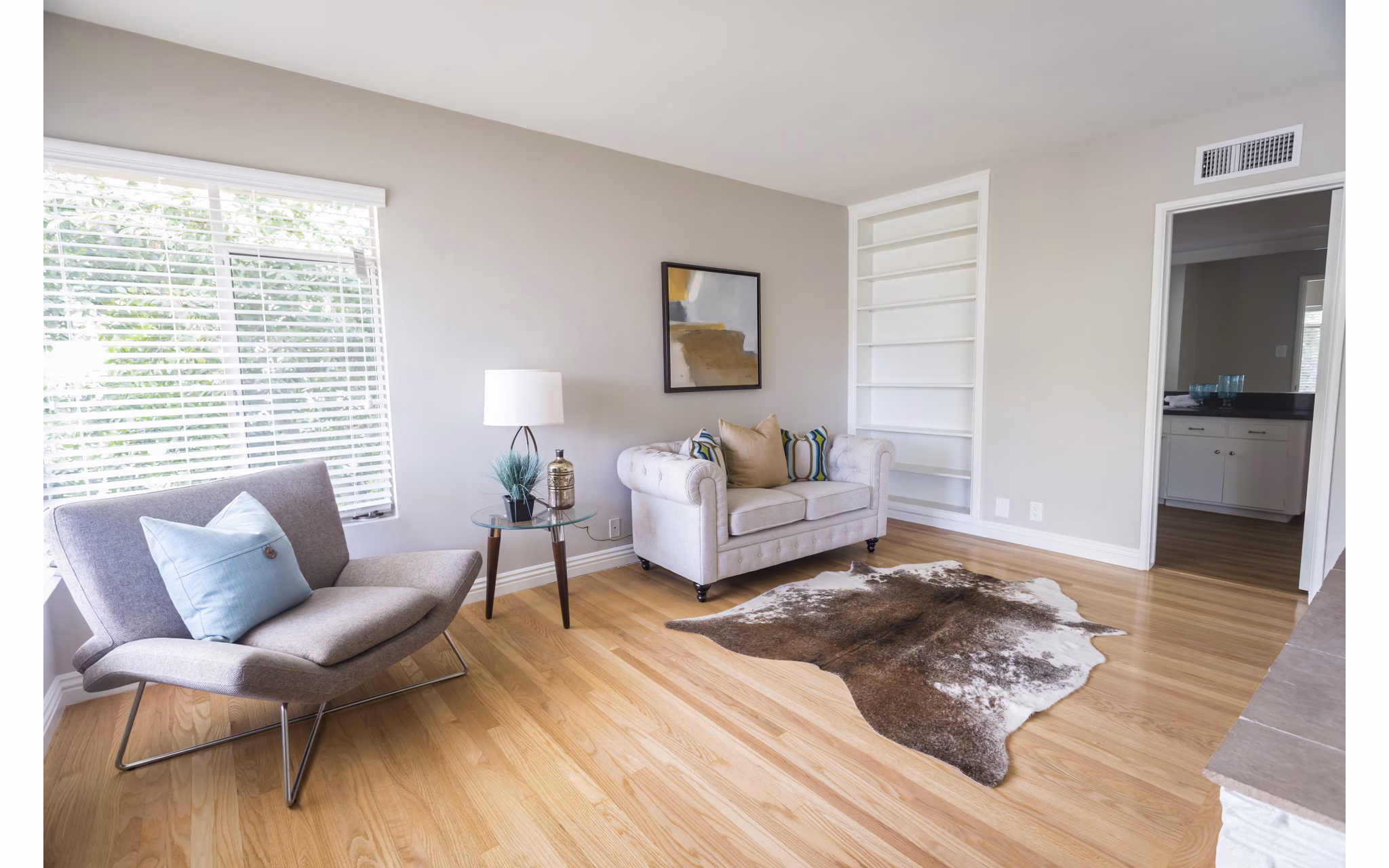 Spacious living room with modern decor at Orange Grove Circle Apartments