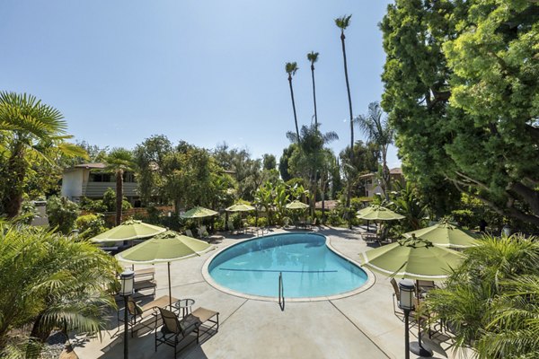 Luxurious pool area at Orange Grove Circle Apartments, a Greystar property