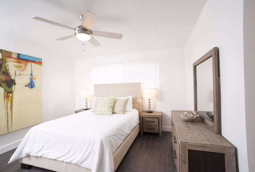Cozy bedroom featuring modern decor at Pacific Rose Apartments