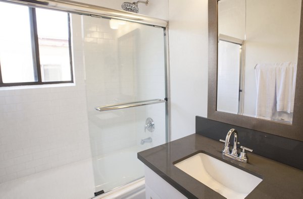 Modern bathroom with sleek fixtures at Pacific Rose Apartments featuring elegant design and luxury amenities