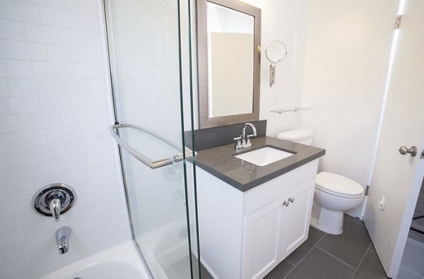 Modern bathroom with sleek fixtures at Pacific Rose Apartments, Greystar luxury property
