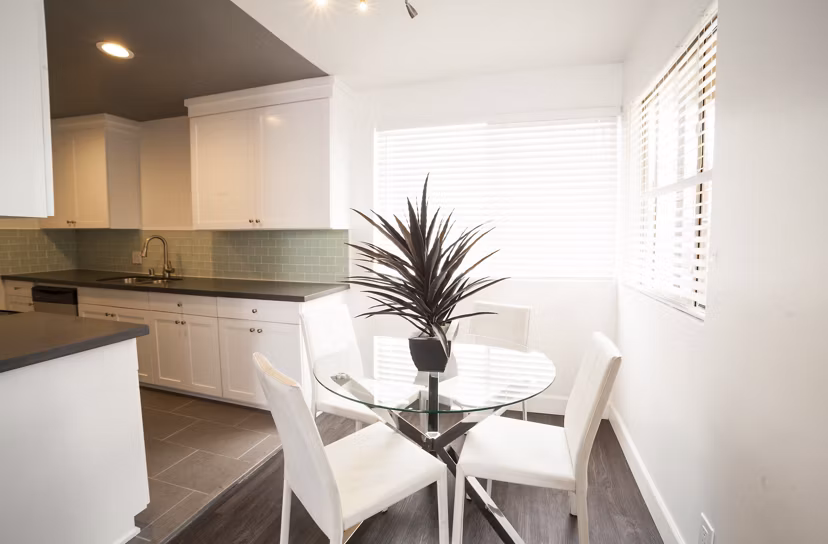 Dining area with modern furnishings at Pacific Rose Apartments