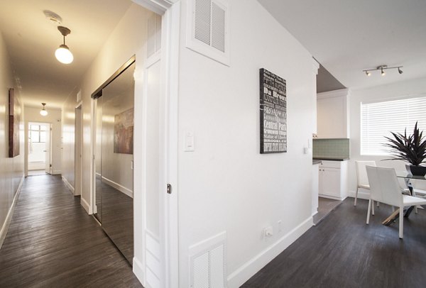 Cozy living room with modern decor at Pacific Rose Apartments