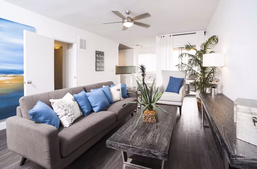 Spacious living room with modern decor at Pacific Rose Apartments