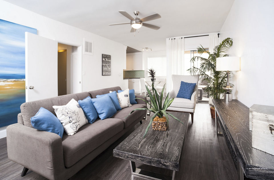 Spacious living room with modern decor at Pacific Rose Apartments