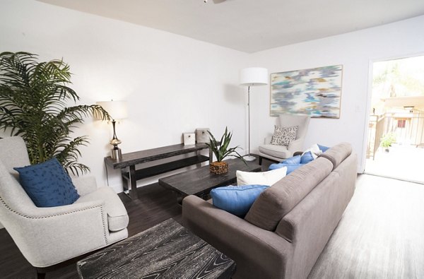Spacious living room with modern furnishings at Pacific Rose Apartments, luxury high-rise apartments, perfect for city living and relaxation