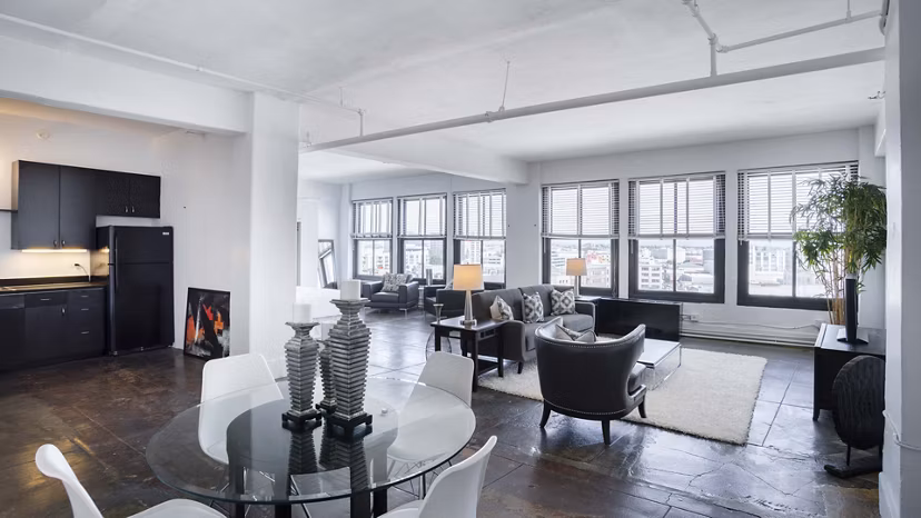 Dining area with chic decor and natural lighting in San Fernando Building Apartments