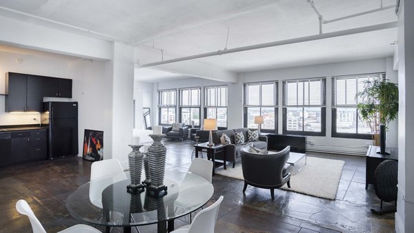 Dining area with chic decor and natural lighting in San Fernando Building Apartments
