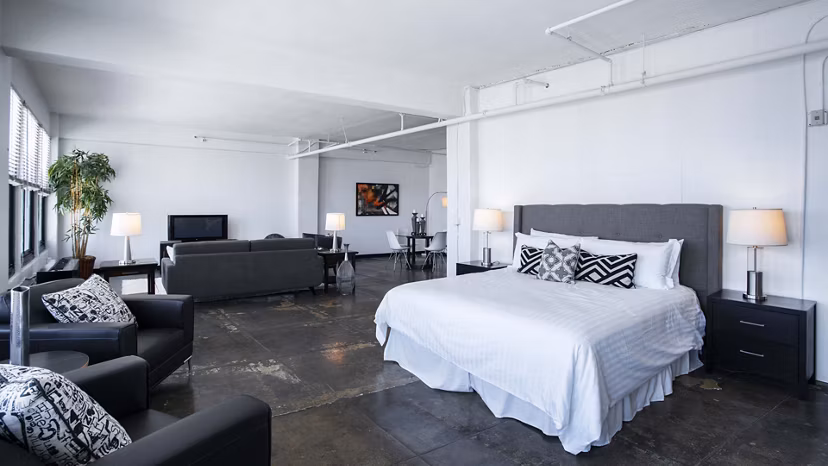 Modern kitchen with stainless steel appliances in San Fernando Building Apartments