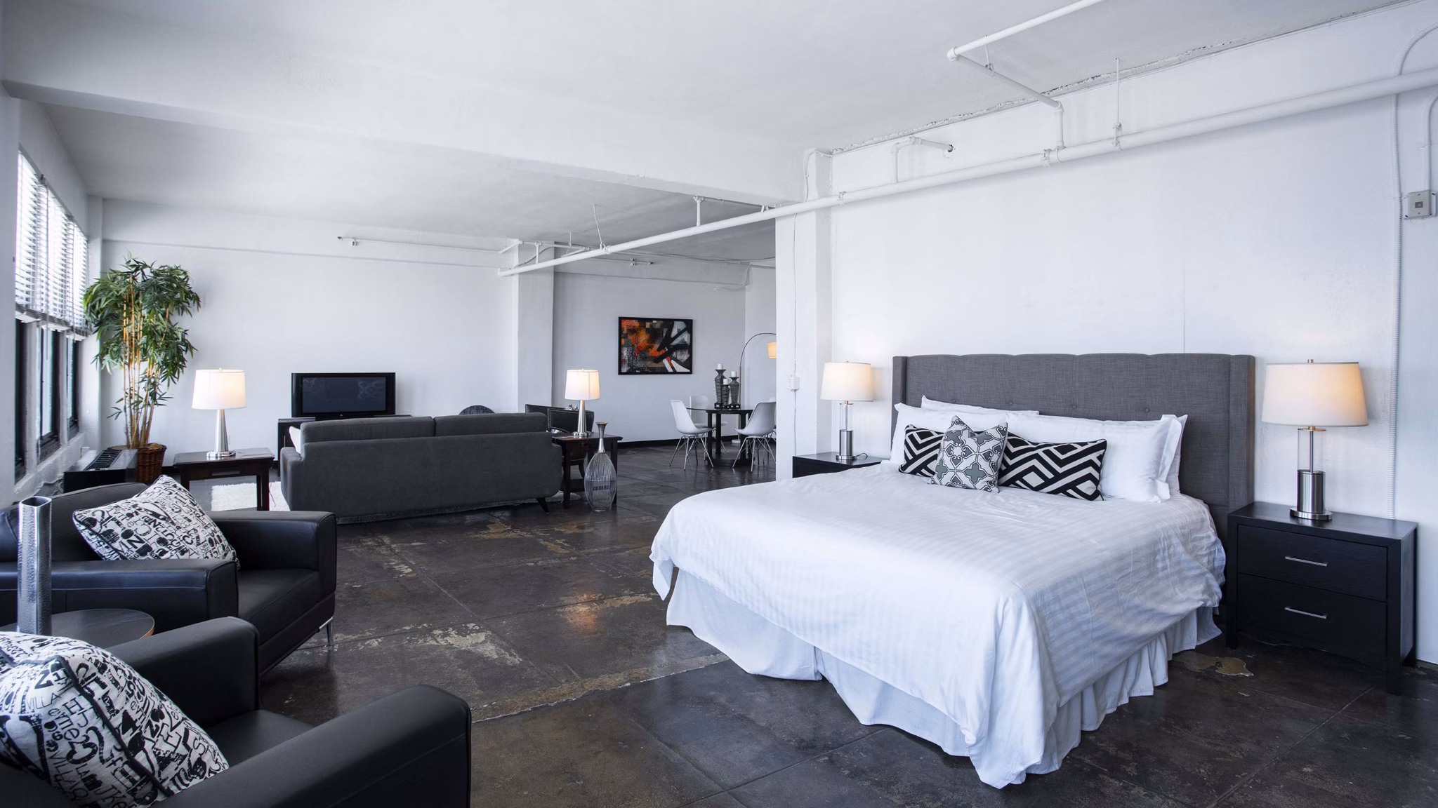 Modern kitchen with stainless steel appliances in San Fernando Building Apartments