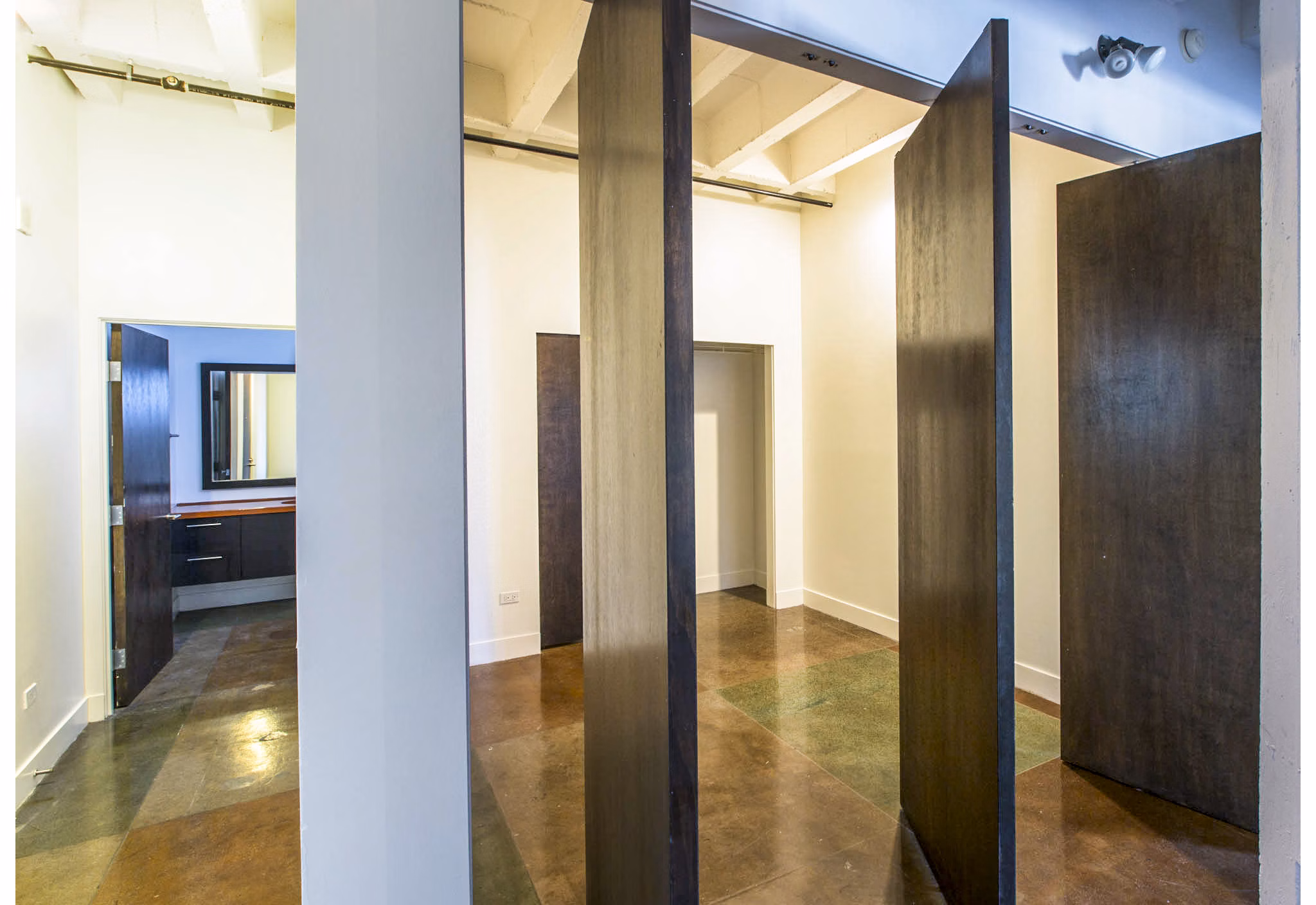 Cozy bedroom with modern decor at South Park Lofts Apartments