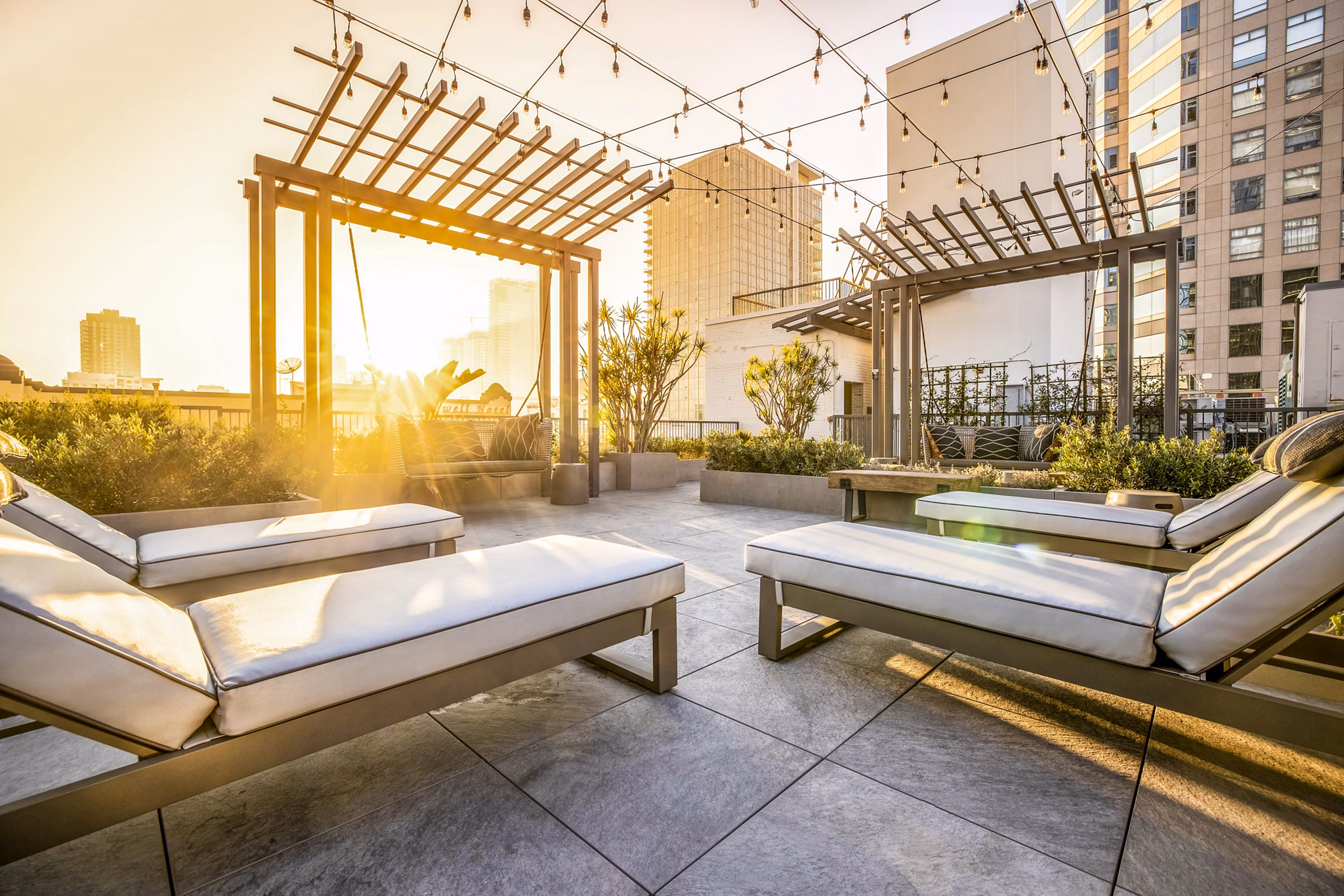 Spacious patio balcony overlooking city views at South Park Lofts Apartments, a Greystar luxury living community