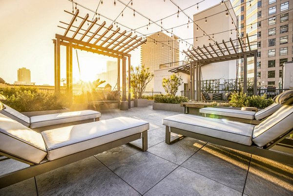 Spacious patio balcony overlooking city views at South Park Lofts Apartments, a Greystar luxury living community