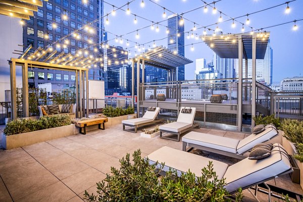 Private patio overlooking cityscape at South Park Lofts Apartments