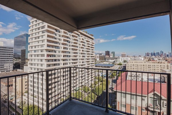 Balcony view of cityscape with buildings and clear sky at The View Apartments