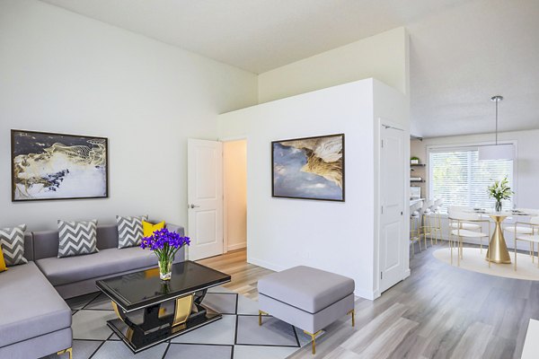 Spacious living room with modern decor in Larkspur West Linn Apartments, offering luxury living near Portland