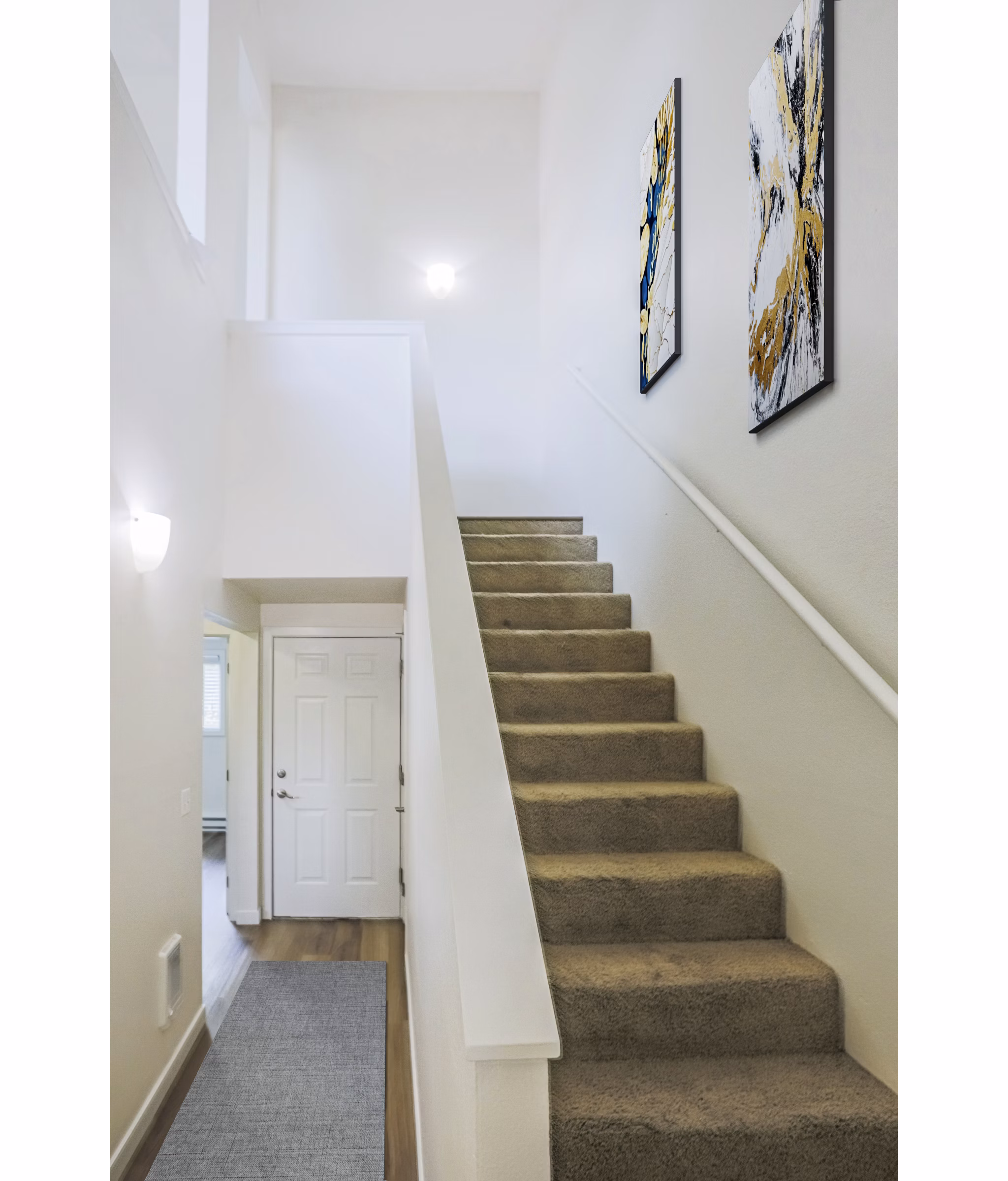 Larkspur West Linn Apartments: Elegant stairway with modern design elements in luxury apartment building